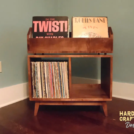 Dark brown solid wood record stand with two open storage bins, backstops, and two vinyl flip bins.
