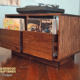 Dovetail 2 x 1 record player cabinet features 2 pull out vinyl storage drawers below a turntable shelf. This LP turntable stand is available in solid walnut, ash, red oak, maple, cherry and oak, all on a 3 inch 100% hardwood plinth base.