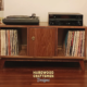 Solid walnut media console with doors, available 42 to 72 inches wide. Perfect for vinyl record storage with 3 compartments and a large shelf top for your tv.