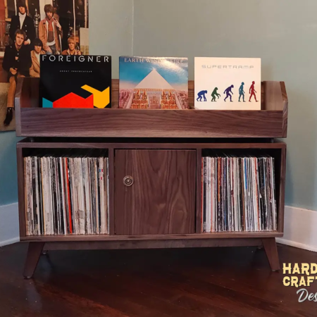 Solid walnut record player cabinet with doors features 3-to-5 vertical bins below 3-to-5 LP flip bin compartments, This vinyl stand 2-tier is available from 42-to-70-inches, all on tapered mid-century legs.