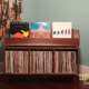 Large solid maple record cabinet with 3 upper vinyl flip bins, three divided storage compartments, and tapered mid-century legs with crossbars.