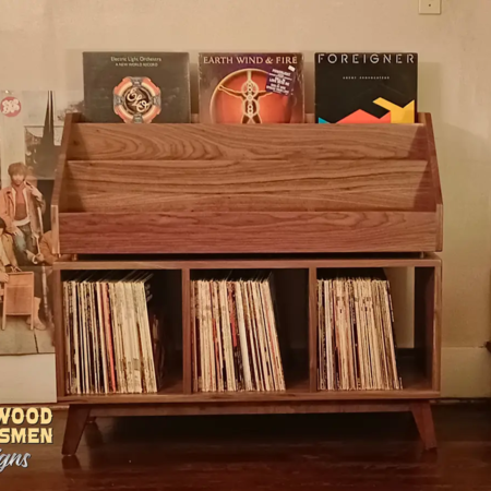 Solid walnut record player stand 4-tier with 9-to-15 LP flip bin compartments, available from 42-to-70-inches. This vinyl storage cabinet features upper forward facing bins above 3-to-5 divided compartments, all on tapered mid-century legs.