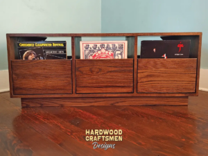 Solid hardwood dovetail 3 x 1 record storage cabinet with slide out drawers.