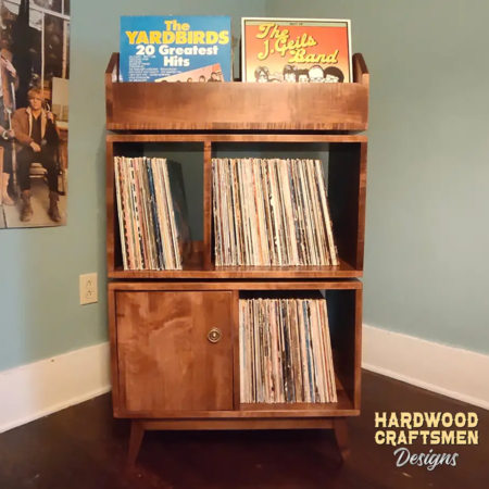 Solid maple vinyl record storage 4-bin with doors & 2-to-4 LP flip bin compartments, available from 28-to-56-inches. This LP stand 3-tier features upper forward facing bins above 4-to-8 divided compartments, all on tapered mid-century legs.