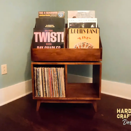 Solid cherry record player stand features 2-to-4 bins below 6-to-12 LP flip bin compartments, This vinyl cabinet 4-tier is available from 28-to-56-inches, all on tapered mid-century legs.