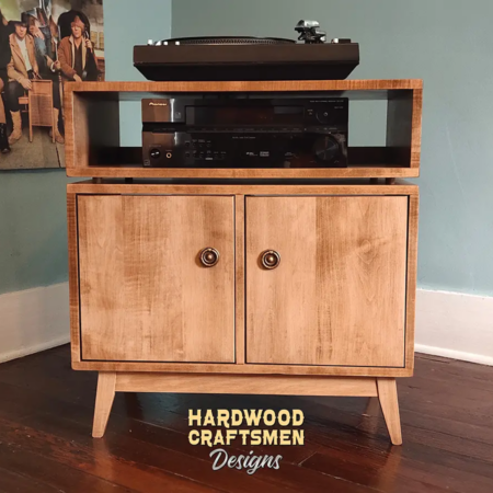 2-level solid maple record console with a turntable shelf, 2-door, 2 storage bins, and tapered mid-century legs.