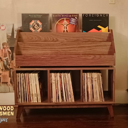 Solid walnut vinyl record storage features 3-to-5 vertical bins below 9-to-15 LP flip bin compartments, This vinyl stand 4-tier is available from 42-to-70-inches, all on tapered mid-century legs.