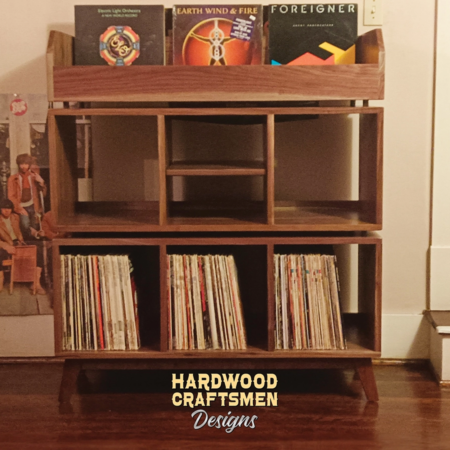 Solid walnut record storage cabinet featuring 6-to-10 compartments below 9-to-15 LP flip bins. This vinyl stand 5-tier is available from 42-to-70-inches, all on tapered mid-century legs.