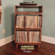 Solid maple record cabinet with wood drawers & 2 x 3 layout with 4 vinyl bin compartments, available from 28 to 72 inches. This record player stand features an upper audio shelves above four divided compartments, all on tapered mid-century legs.