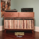 Solid walnut record player cabinet 3 x 1.5 with 3 vinyl storage bin compartments, available from 42 to 72 inches. This media console & cabinet features dovetail drawers, an upper TV shelf above three divided compartments, all on tapered mid-century legs.