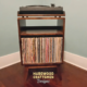 Record console with audio bays & vinyl storage in solid cherry featuring 1-to-4 lower bins below equipment bays & turntable shelf. This media stand 2-tier is available from 20-to-48-inches, all on tapered mid-century legs.