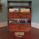 Dovetail 2 x 2.5 record player cabinet features 4 pull out LP storage drawers below an audio equipment and turntable shelf. This vinyl stand is available in solid walnut, ash, red oak, maple, cherry and oak, all on a 3 inch 100% hardwood plinth base.